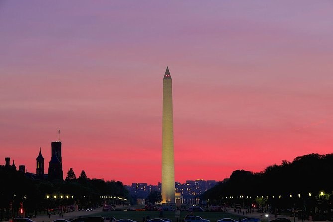 The Washington Monument against a pink sky just after sunset